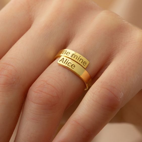 Entangled Heart and Name Engraved Gold Love Bands | Couple ring design,  Couple rings gold, Gold ring designs